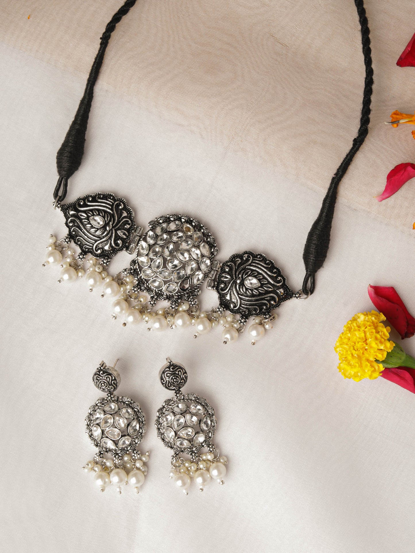 The Cranberry Ornated Stud Necklace Set in White